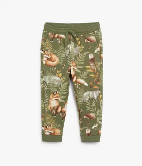 Kids green forest print jogging trousers